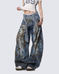 Distressed Stain-Dye Embroidered Scimitar Jeans